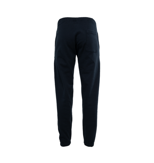 Image 2 of 4 - NAVY - HUMAN MADE Sweatpant featuring elastic waist and hems, side pockets, one back patch pocket and branding on leg. 100% cotton. 
