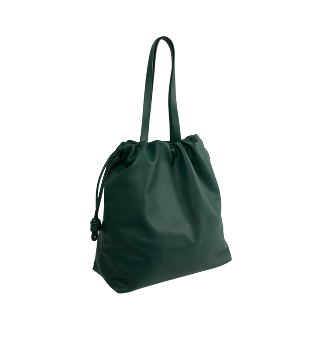 Image 2 of 3 - GREEN - LOEWE Flamenco Logo Tote featuring logo in contrasting letters, two top handles, internal zipped pocket, suede lining and drawstring fastening. 10.2in x 15.7in x 15in. Calfskin. 