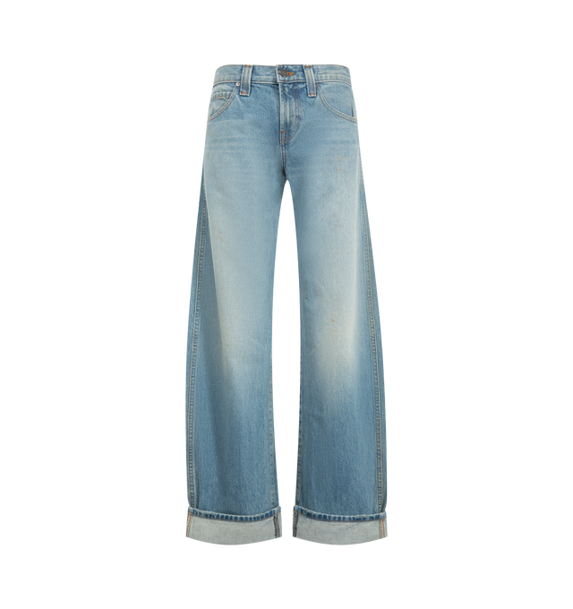 Image 1 of 3 - BLUE - Khaite Women's Karo Jean is crafted from rigid cotton denim and features a low-rise silhouette designed to sit low on the hips, detailed with curved seams that create a bowed leg shape, cuffed hems, classic five-pocket styling, and an antiqued nickel embossed button closure. Main Material: 100% Cotton. Made in USA. 