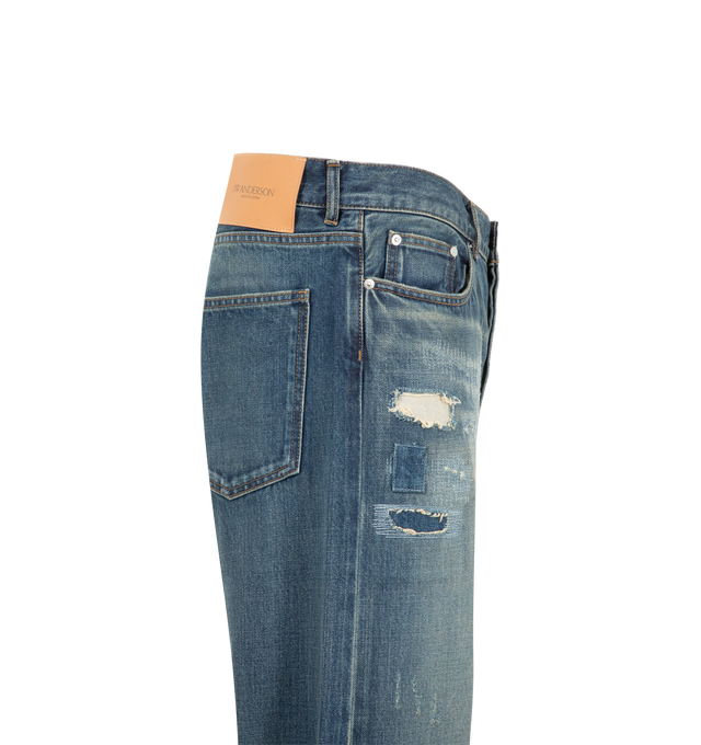Image 3 of 3 - BLUE - JW Anderson Men's Straight Leg Denim Jeans are crafted from Japanese selvedge denim and feature a classic mid-rise, straight-leg silhouette in a dark blue wash. Developed in collaboration with expert Japanese denim makers, the jeans are designed with a leather logo patch, custom logo shank buttons and rivets, an anchor rivet at the ticket pocket, and a pocket bag screen-printed with "Made in Japan." Main Material: 100% Cotton. Lining: 100% Cotton. Made in Japan. 