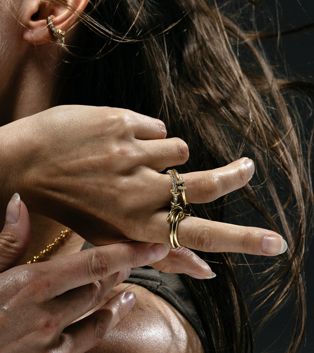 Spinelli Kilcollin gold and diamond linked rings 