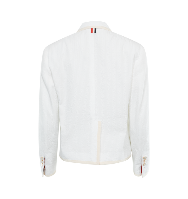 Image 2 of 2 - WHITE - THOM BROWNE Shrunken Sack Jacket featuring cotton seersucker, front patch pockets, chest pocket, 2 button closure and signature grosgrain loop tab. 