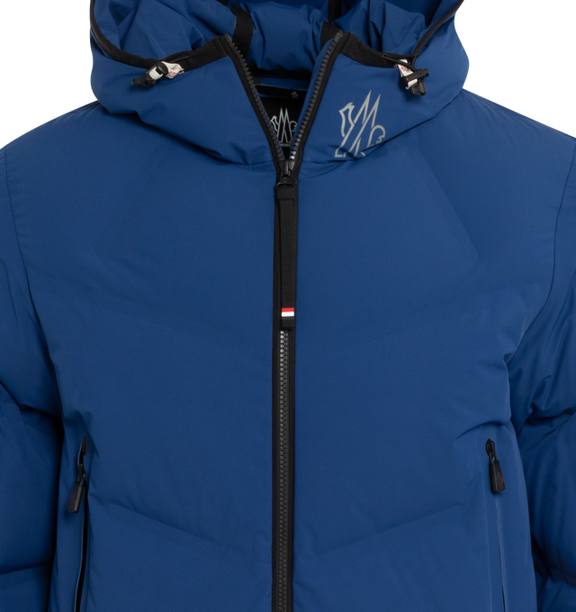 Image 3 of 3 - BLUE - MONCLER GRENOBLE ACRESAZ JACKET is made with 2L 4-way, stretch tech poplin, stretch nylon lining, down-filled, has heat-sealed seams, adjustable hood with drawstring fastening, DAY-NAMIC" transfer, "MONCLER" lettering, YKK Aquaguard Highly Water Resistant zipper closure, exterior pockets with interior media pocket, stretch jersey wrist gaiters, ski pass pocket with YKK Aquaguard Highly Water Resistant zipper closure, hem with elastic drawstring fastening and embossed silicone logo. 