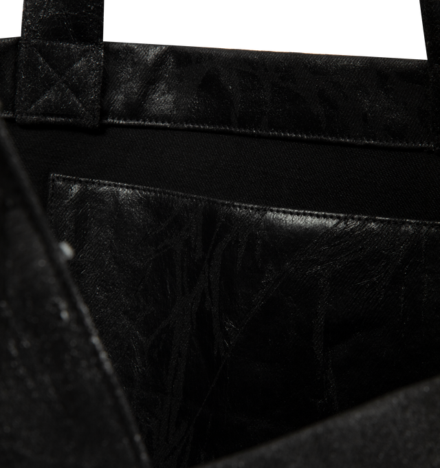 Image 3 of 3 - BLACK - The Rick Owens DRKSHDW Temple Shopper is cut from the brand's signature Megacrust cotton denim, transforming Japanese 13oz denim through black overdyeing, wax treatment, layered foil, and a final wash that creates its distinctive cracked, eroded surface. Dimensions Approximately: 20 x 13 x 2 in. 