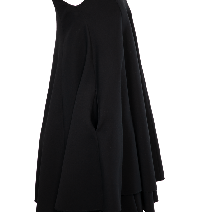 BLACK - LOEWE DOUBLE LAYER DRESS is a double layer dress crafted in medium-weight silk and wool crepe with a regular fit, short length, layered construction, pleated volume silhouette, round neck, invisible zip back fastening, seam pockets, raw edges and anagram embossed leather tab at the hem.  100% cotton, 51% silk, 44% wool, 5% calfskin leather