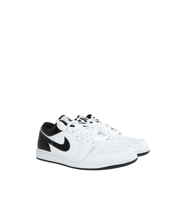 WHITE - AIR JORDAN 1 LOW features leather in the upper, foam outsole, wings logo on heel, stitched-down Swoosh logo and Jumpman design on tongue.