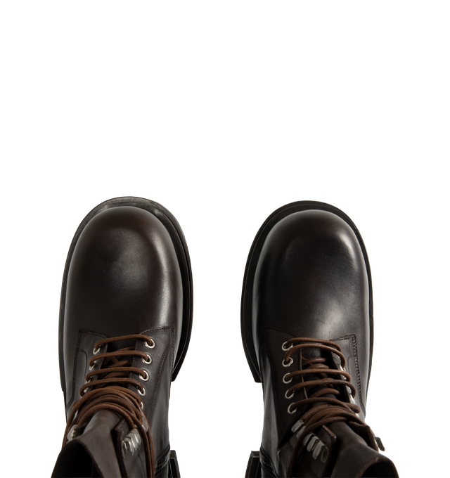 Image 4 of 4 - BROWN - Rick Owens Men's Laceup Bogun Boots are crafted from washed calf leather and feature a mid-calf silhouette with long wraparound laces, a rounded toe, and the brand's signature Bogun rubber mega creeper sole. Designed with eyelets and hooks, angled topstitched panels, an inner-leg zip closure, a back pull tab, and a toothed square heel for a bold, architectural look. Main Material: 100% Calf Leather. Lining: 100% Calf Leather. Insole: 100% Calf Leather. Intersole: 100% Cow Leather. Sol 