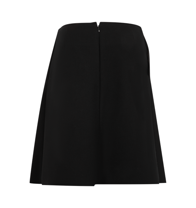 Image 2 of 3 - BLACK - Toteme Women's Sculptural Skirt is crafted from a viscose blend with a spongy texture and features a low-rise silhouette, a streamlined shape, and a high slit extending to the knee for ease of movement. Designed with side-seam pockets and a concealed back zip closure, this versatile style can be worn alone or layered over dresses, tights, or leggings. Main Material: 68% Viscose, 17% Wool, 15% Polyurethane.  