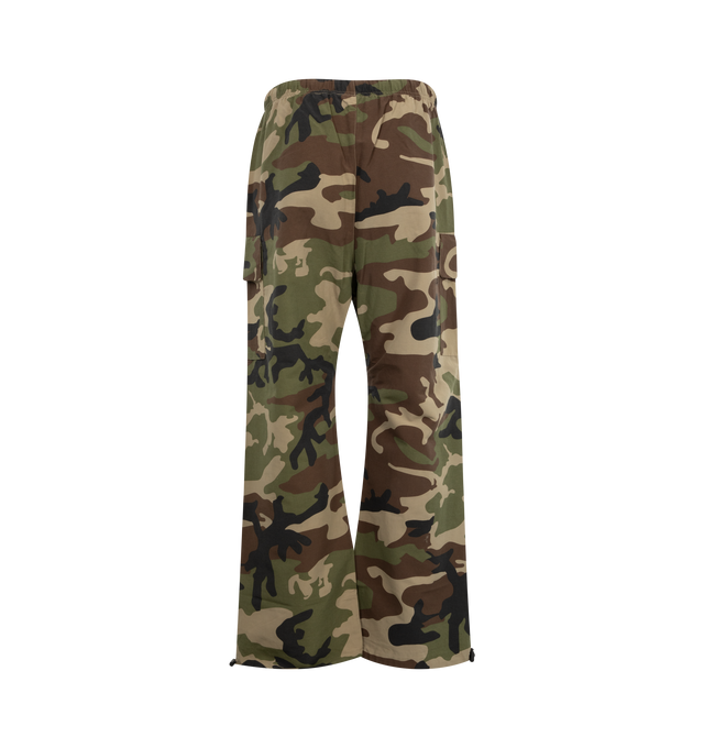 Image 2 of 3 - GREEN - Fear of God Essentials Military Field Pants are designed in camouflage nylon-viscose with a perforated lining, cargo pockets, an elastic drawstring waist, side pockets, and ankle bungees.  