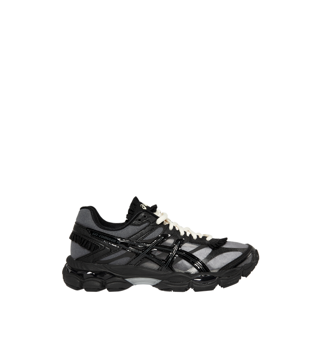 Image 1 of 5 - BLACK - Asics Men's Gel-Cumulus 16 Sneakers feature a synthetic upper with seamless paneling and synthetic leather overlays for a streamlined, supportive fit. Inspired by the brand's iconic 2010s running silhouette, these lifestyle sneakers combine dual GEL cushioning and a FLUIDRIDE midsole for lightweight comfort, responsive cushioning, and everyday wear. Main Material: Synthetic. Sole: Rubber. 