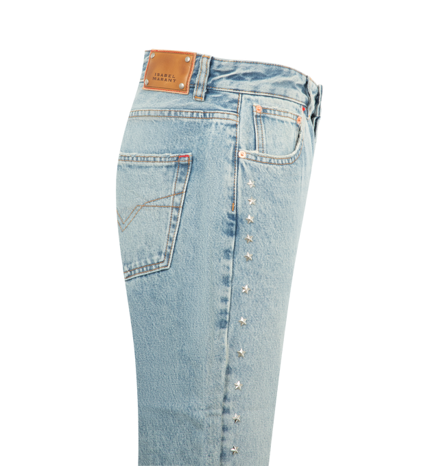 Image 3 of 3 - BLUE - Isabel Marant Women's Dayali Reg Jeans are crafted from vintage-blue cotton denim and feature a low-rise waist with a long-leg boyfriend fit. Silver-tone star studs embellish the back, coin pocket, and legs, while red contrast stitching, a signature red rivet, a studded leather jacron, and frayed hems complete the design. Finished with front scoop pockets and back patch pockets. Main Material: 100% Cotton. 