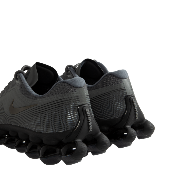 Image 3 of 5 - GREY - Nike Air Liquid Max Sneakers feature a textured upper with a low-cut silhouette for modern style and lasting comfort. These performance-inspired lifestyle sneakers combine a drop-in Cushlon midsole with a full-length point-loaded Max Air cushioning system for exceptional responsiveness, lightweight support, and all-day comfort. Main Material: Textile and Synthetic. Midsole: Cushlon with Max Air Cushioning. Sole: Rubber. 