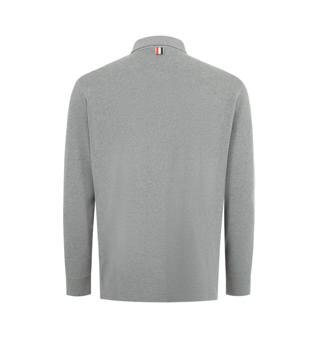 Image 2 of 3 - GREY - THOM BROWNE Waffle-Texture Rugby Polo Shirt featuring waffle knit cotton, signature name tag appliqu, point collar, concealed half placket, contrast chest pocket, ribbed cuffs, vented sides with striped grosgrain trim and pullover style. Cotton. Made in Japan. 