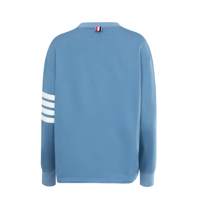 Image 2 of 2 - BLUE - THOM BROWNE Oversized Crewneck Sweatshirt featuring logo patch to the front, signature four-bar stripe, crew neck, long sleeves, fitted-cuff sleeves, kangaroo pocket and asymmetrical hem. 100% cotton.  