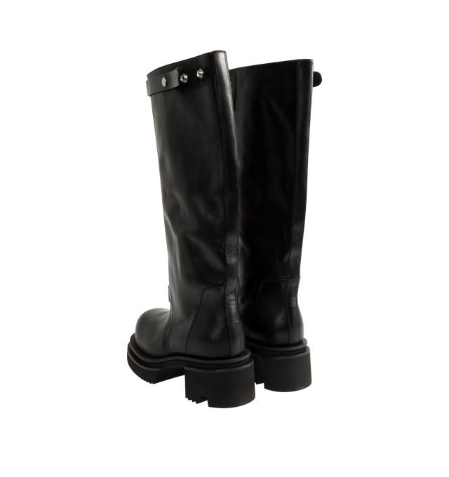 Image 3 of 4 - BLACK - Rick Owens Men's Naska Bogun Boots are crafted from washed calf leather and feature an under-the-knee silhouette with a wide shaft, a snap-fastening strap at the top, rounded toes, a geometric heel counter, and a Bogun rubber mega creeper sole with a toothed square heel. Main Material: 100% Calf Leather. Lining: 100% Calf Leather. Insole: 100% Calf Leather. Height: Under the Knee. Made in Italy. 