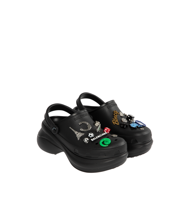 Image 2 of 4 - BLACK - BALENCIAGA Crocs Mule in black rubber with Jibbitz charms featuring EVA foam, mule, round toe, open at back, 5mm arch, removable Jibbitz charms, Balenciaga logo embossed on strap, debossed size at back and tone-on-tone sole and insole. 