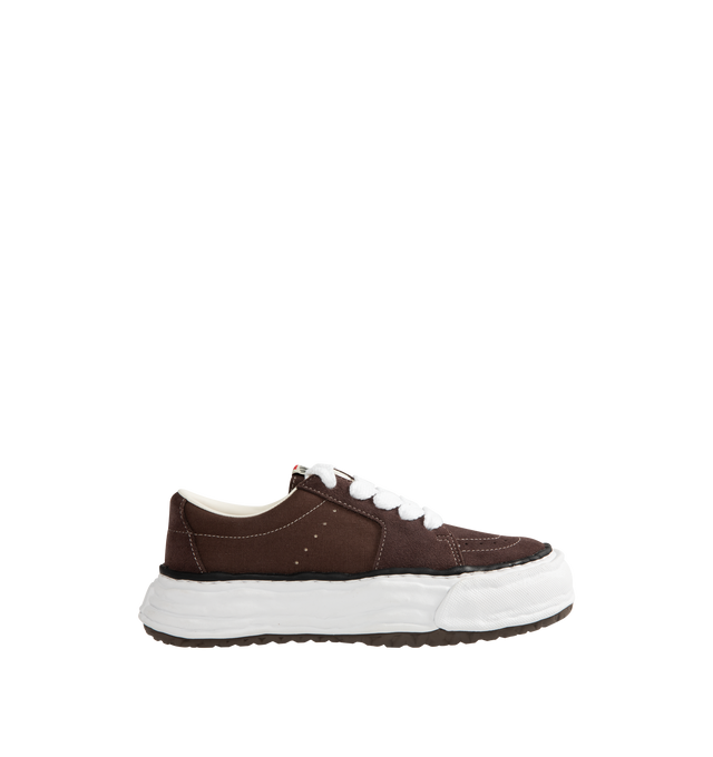 Image 1 of 5 - BROWN - Maison Mihara Yasuhiro Men's Eric Sneakers feature the brand's signature hand-sculpted OG sole, a mixed-material suede and canvas upper, and distinctive toe stitching for a bold contemporary look. Designed for the Spring/Summer 2026 collection, these designer low-top sneakers combine Maison Mihara Yasuhiro's experimental aesthetic with everyday comfort, while the handcrafted-inspired sole and intentional vintage detailing create a truly distinctive silhouette. Main Material: Cow Leath 