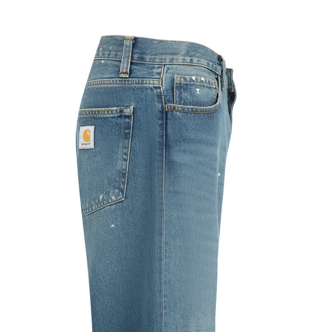 Image 3 of 3 - BLUE - Carhartt WIP Mens Landon Pants are crafted from heavyweight cotton denim. Features a loose tapered fit with a regular waist, five-pocket styling, back yoke, bartack stitching at stress points, zip fly, and an artificial leather Square Label at the back pocket. Main Material: 100% Cotton Denim. Made in Tunisia. 