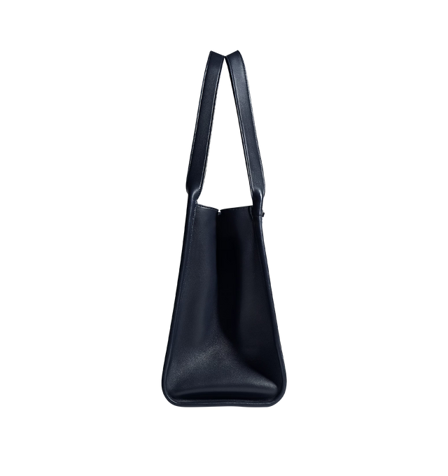 Image 2 of 3 - NAVY - BOTTEGA VENETA Corriere Bag featuring tote bag in supple Intrecciato nappa leather, detachable leather tag with keyring, one interior Intrecciato zipped pocket and magnetic closure. 14.6" x 13.8" x 8.3". Lambskin. Lining: suede. Made in Italy.   