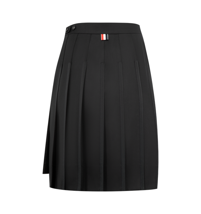 Image 2 of 3 - BLACK - THOM BROWNE Super 120's Twill Pleated Skirt featuring lightweight Super 120's Twill wool twill, bermuda length, side zip closure with RWB-detailed pull, adjustable waistband button-fastening strap, grosgrain trim at pleats, side vents with RWB grosgrain trim, stepped hem and signature striped grosgrain loop tab. 100% wool. Lining: 100% cupro. Made in Italy. 
