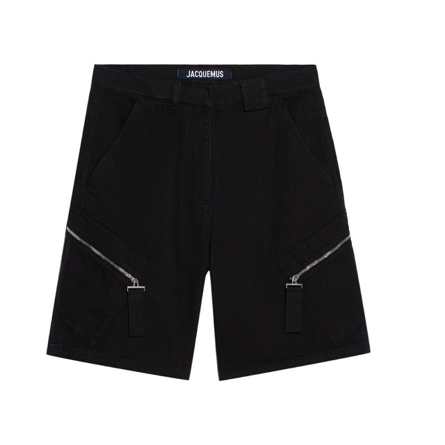 Image 1 of 1 - BLACK - JACQUEMUS Le short Marrone Shorts featuring belt loops, two-pocket styling, zip-fly, cargo pocket at outseams and logo-engraved silver-tone hardware. 100% cotton. Made in Italy.