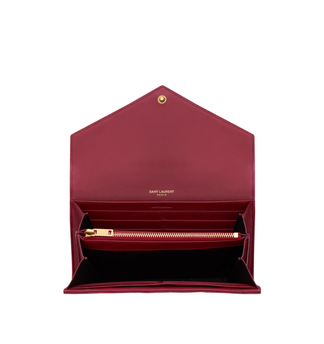 Image 3 of 3 - RED - SAINT LAURENT Large Flap Wallet in lambskin featuring quilted topstitching, bronze-tone hardware, snap-button closure, twelve card slots, one coin pocket, two bill compartments and two receipt compartments. 7.5" x 4.3" x 1.2". Lambskin. Made in Italy. 