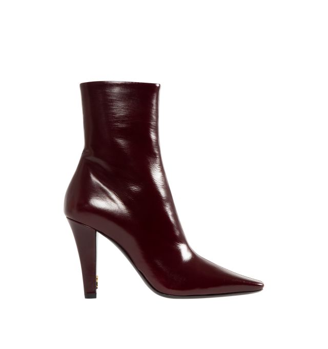 Image 1 of 4 - RED - SAINT LAURENT Jill Booties featuring ankle boots with a square pointed toe and tapered block heel with inner cassandre, a side zip closure and leather sole. 3.7 inch heel. Calfskin. Made in Italy. 