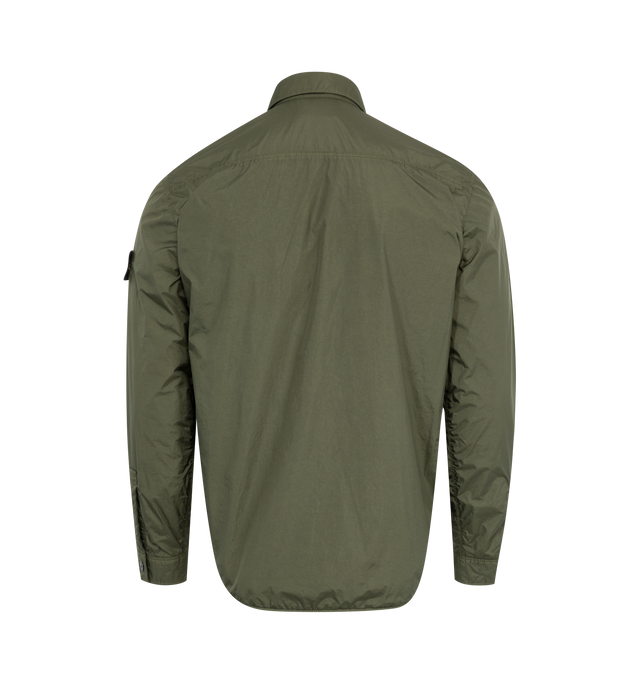 Image 2 of 3 - GREEN - STONE ISLAND Light Outerwear Jacket featuring chest pocket, adjustable snap at cuffs, neck button, Stone Island badge on the left sleeve and two-way hidden zipper fastening. 100% recycled light nylon. 