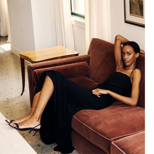 Image 4 of 4 - BLACK - The Row Women's Javier Dress is crafted from lightweight silk georgette and features a bias-cut silhouette with a fitted waist, flared hem, and a squared neckline accented by a slim halter strap. This designer silk dress combines exceptional Italian craftsmanship with an airy, fluid drape, creating an effortlessly elegant silhouette for day-to-evening occasions. Main Material: 100% Silk. Made in Italy. 