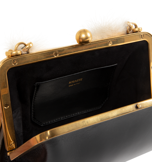 Image 3 of 3 - BLACK - Khaite Lilith Small Evening Bag has a fixed handle covered in shearling, a hinged closure with a logo-engraved gold-tone closure, 3 interior card slots, and a snake chain shoulder strap. H 8.25 x W 7 x D 1.25 inches. 100% calfskin. Made in Italy.  