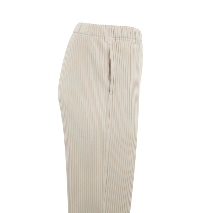 Image 3 of 3 - NEUTRAL - ISSEY MIYAKE Pleated Straight-Leg Pants featuring elasticized waist, side slip pockets, full length and relaxed fit through straight legs. 100% polyester.  