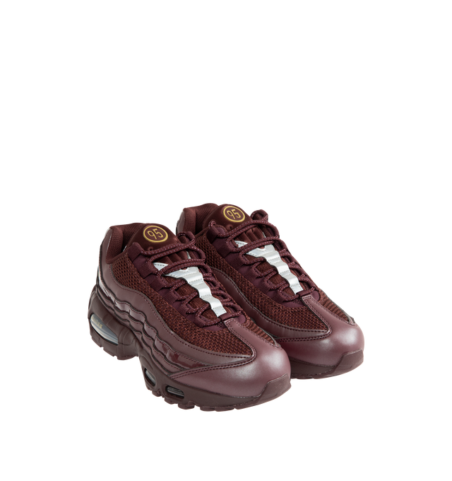 Image 2 of 5 - RED - NIKE Air Max 95 Big Bubble Sneaker featuring upper that mixes synthetic leather and textiles for a layered look, visible Max Air cushioning, flex grooves in the midsole and outsole, foam midsole and rubber outsole. 