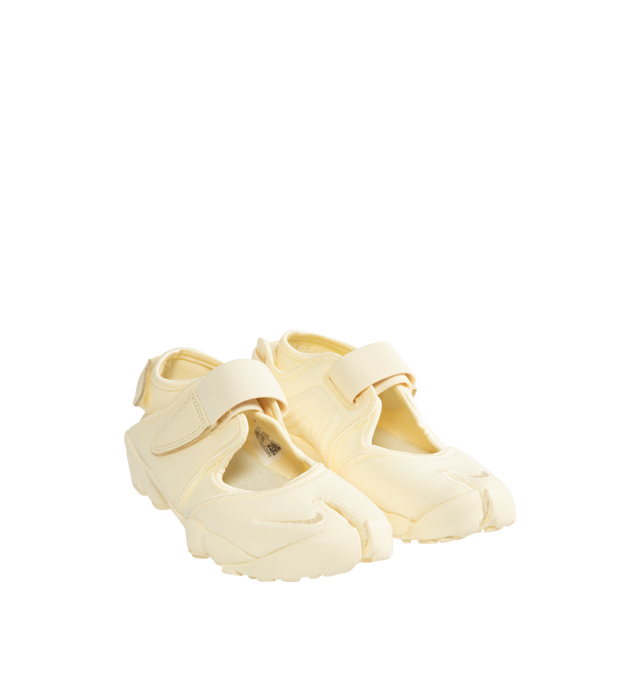 Image 2 of 5 - WHITE - NIKE Air Rift Sneaker featuring hook-and-loop straps on the midfoot and heel, Nike Air unit in the heel combined with plush foam, rubber detailing on the outsole, upper features a blend of elastane, polyester and nylon materials for a flexible fit and split toe design. 