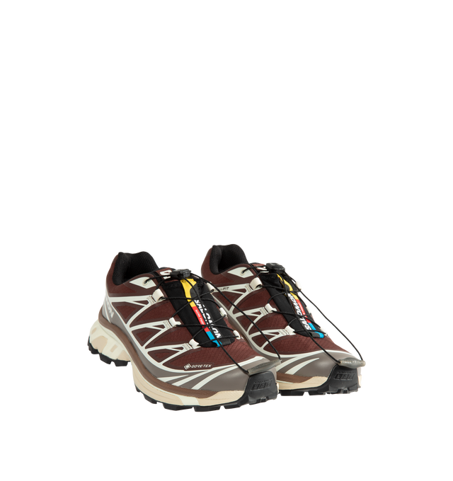 Image 2 of 5 - RED - Salomon XT-6 GORE-TEX Sneakers are crafted from synthetic and textile materials and feature the iconic XT-6 silhouette updated with waterproof GORE-TEX protection for all-weather performance. Originally developed as a high-performance trail running shoe, this modern iteration combines the model's signature comfort, cushioning, and stability with upgraded materials and fresh colorways designed for everyday urban wear. Main Material: Synthetic and Textile Upper. Lining: Textile. Insole: T 