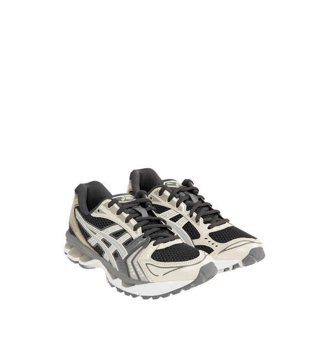 Image 2 of 5 - GREY - Asics GEL-Kayano 14 Sneakers are lace-up style with rip-stop underlays, GEL cushioning, and TRUSSTIC support system. Unisex style in men's sizing. 