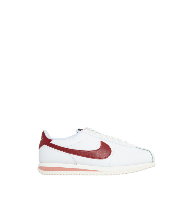 WHITE - NIKE CORTEZ features foam midsole, wedge insert, leather upper, rubber sole with herringbone pattern and a padded, low-cut collar.