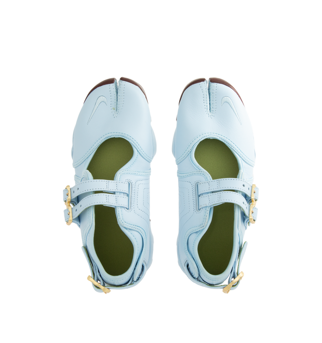 Image 5 of 5 - BLUE - Nike Women's Air Rift Shoes feature the iconic split-toe silhouette inspired by barefoot running and designed for effortless everyday comfort. Crafted with a genuine leather upper that softens and develops character over time, this distinctive style is equipped with adjustable buckle straps for a secure fit and a Nike Air unit in the heel paired with a plush foam midsole for lightweight cushioning. Finished with rugged rubber outsole detailing for enhanced traction and durability. Main 