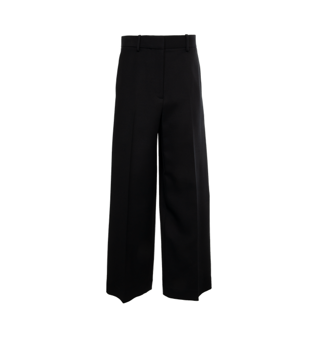 Image 1 of 4 - BLACK - KHAITE Bacall Pant featuring low waist, long-rise, tailored in softly structured suiting and added room in the leg for a more relaxed fit. 75% viscose, 25% polyamide. 
