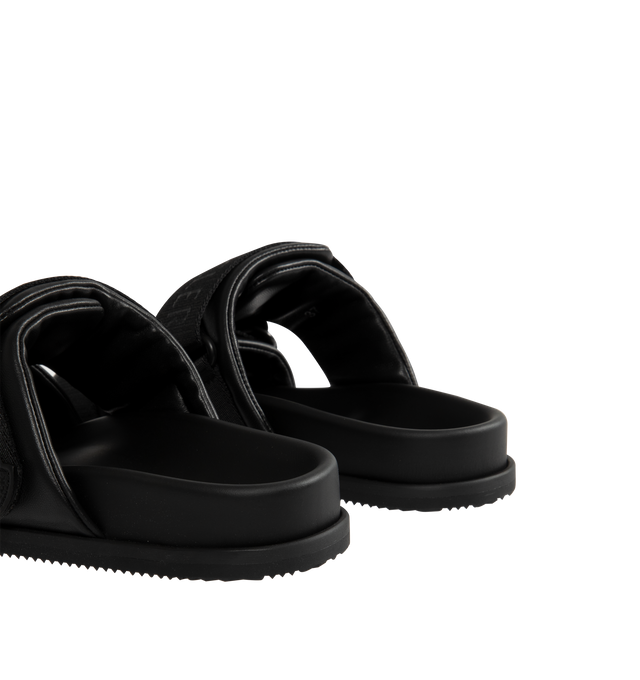 Image 3 of 4 - BLACK - MONCLER Mon Summer Leather Crisscross Sandals featuring crisscross logo-stamped polyester strap, flat heel, dual band upper, slip-on style, molded footbed, rubber outsole. Lining: leather. Made in Italy. 