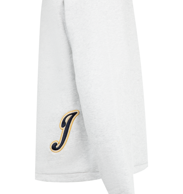 Image 3 of 3 - WHITE - JACQUEMUS Gio Overshirt featuring relaxed fit, brushed cotton fleece, pointed collar, snap button closure, embroidered varsity patch on the front, welt pocket, drawstring hem, embroidered J patch on the back, hip length and fully lined in jersey. 100% cotton. Lining: 100% cotton. Made in Portugal. 