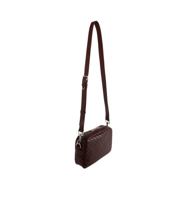 Image 2 of 3 - BROWN - Bottega Veneta men's small cross-body camera bag in Intrecciato leather with detachable strap and metal D-ring. Featuring one interior flat pocket, zip closureCalfskin with canvas lining ans silver finish hardware. Measures height 5.9 X width 9.6 X depth 2.4 with strap drop 21.7. Made in Italy. 