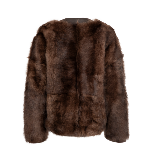 Image 2 of 3 - BROWN - LOEWE Shearling Jacket featuring a fuzzy shearling exterior, leather button placket, side slit pockets. 100% shearling. 100% lamb leather. Filling: 95% polyester, 5% polyamide. Made in Italy. 