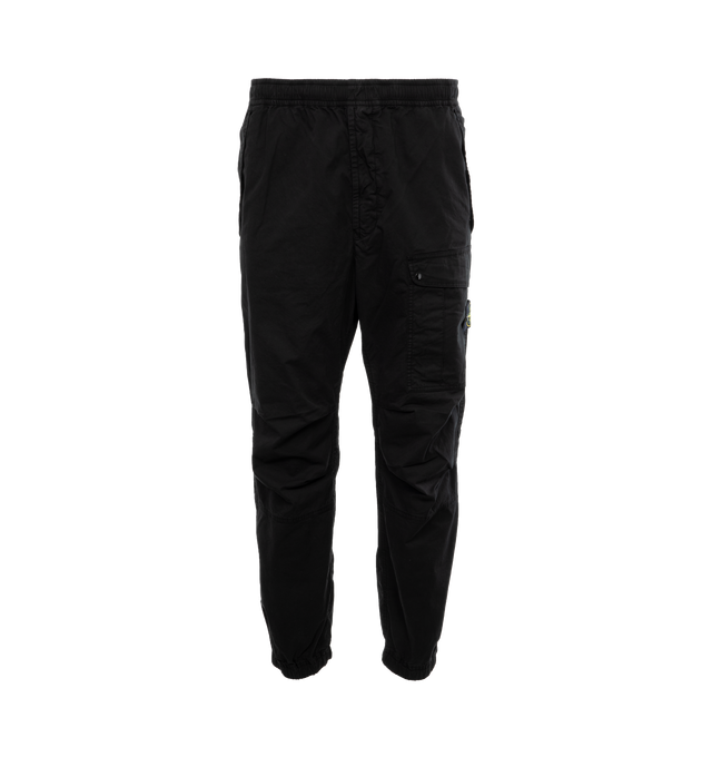 BLACK - STONE ISLAND Loose-Fit Cargo Pants featuring slanting hand pockets with slanted shaped flap and snap fastening, one patch bellows pocket on the back with shaped flap fixed on one side with a snap on the other side, big patch bellows pocket on the left leg, fixed on one side, snap on the other side, Stone Island badge, elasticized leg bottom and elasticized waistband with inner drawstring. 97% cotton, 3% elastane/spandex.