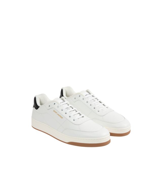 Image 2 of 5 - WHITE - Saint Laurent SL61 Sneakers are a lace-up style with perforated leather at the front, gold-tone logos at the pull tabs and along the sides, and rubber soles. 100% leather. Made in Italy.  