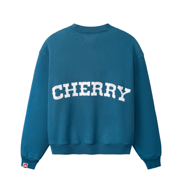 Image 2 of 7 - BLUE - Cherry LA Men's Patch Work Henley Crew is crafted from custom cotton fleece and features a boxy-fit silhouette with patchwork detailing at the chest and a concealed-button Henley placket. Designed for everyday comfort, this elevated sweatshirt is finished with hidden front buttons and a signature branded label at the cuff. Main Material: Custom Cotton Fleece. Made in Los Angeles, California. 