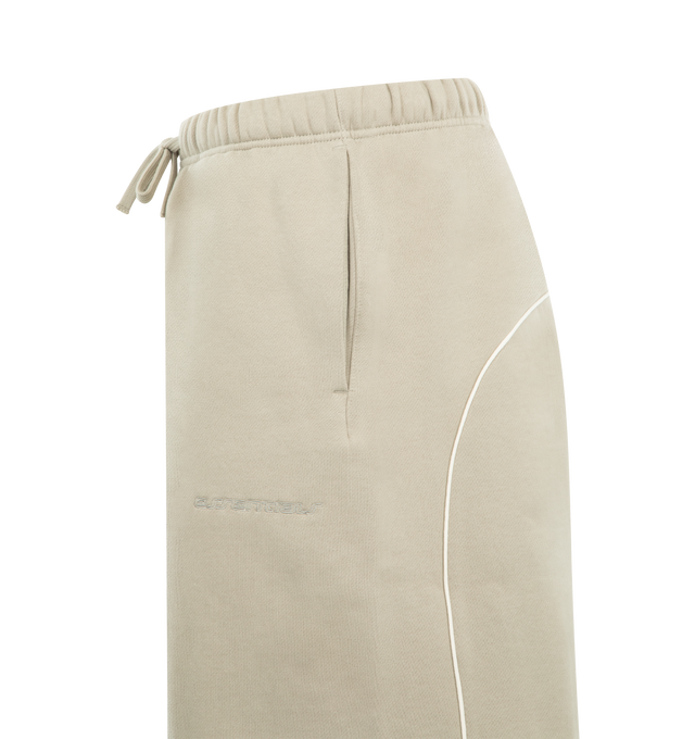 Image 3 of 3 - NEUTRAL - FEAR OF GOD ESSENTIALS Active Trace Relaxed Short featuring drawstring waistband, rubberized logo patch, side seam pockets, embroidered logo and fleece lining. 80% cotton, 20% polyester. 
