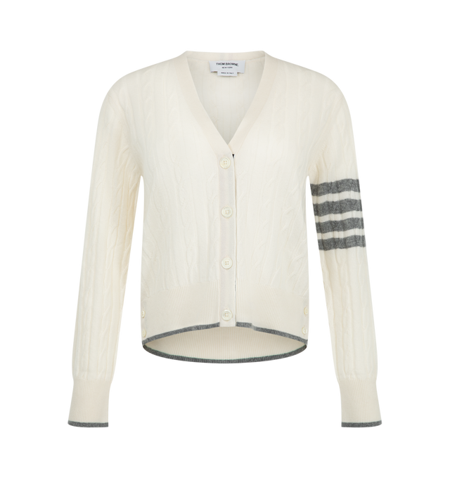 Image 1 of 2 - WHITE - Thom Browne Women's Baby Cable Stitch V-Neck Cardigan is crafted from cashmere and features a baby cable-knit construction, a V-neck silhouette, and the brand's signature 4-Bar stripe detail. Main Material: Cashmere. Made in Italy. 