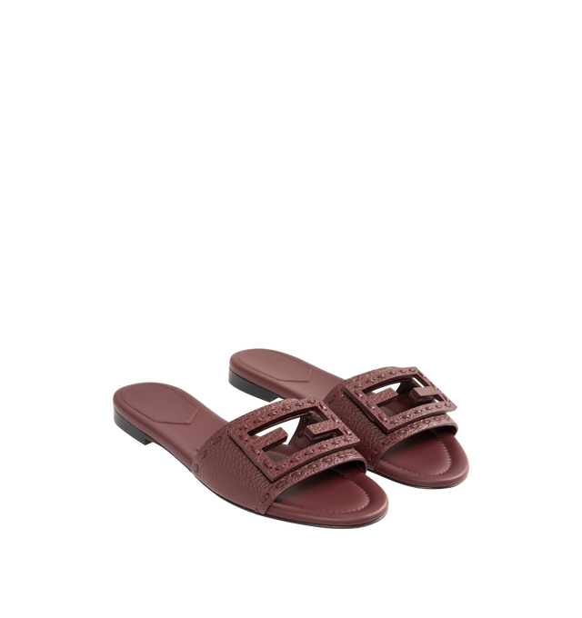 Image 2 of 4 - BROWN - FENDI Baguette Slide featuring wide-band, tumbled leather and embellished with hand-sewn tone-on-tone macro Selleria stitching, an emblem of the iconic Selleria workmanship and tone-on-tone FF Baguette motif. 100% calfskin. Inside: 100% calfskin. Made in Italy. 