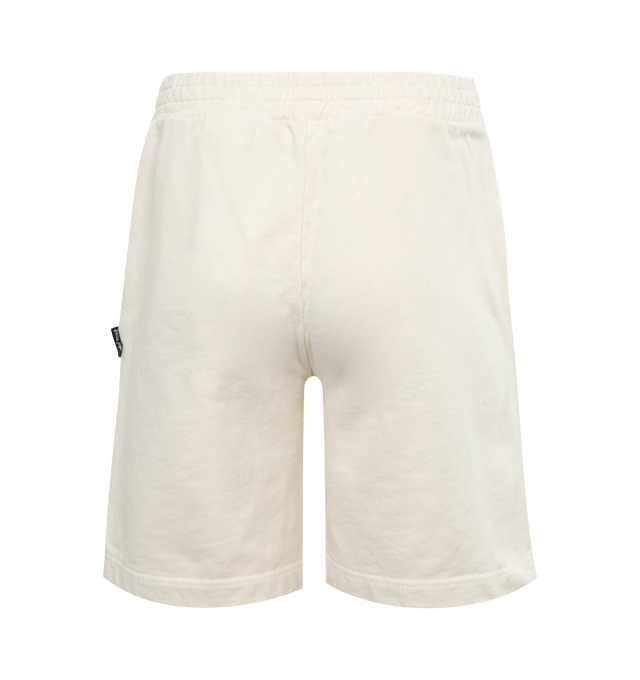 Image 2 of 3 - WHITE - PALM ANGELS Men's butter-colored sweat shorts with vertical pockets and red Palm Angels lettering printed below the elastic waistband at the front. 100% cotton.  