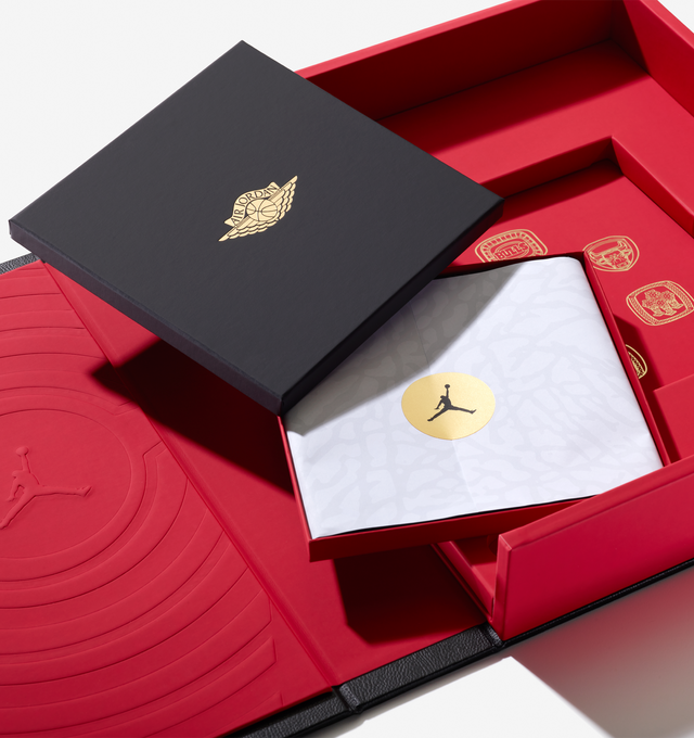 Image 10 of 20 - MULTI - Assouline celebrates 40 years of Air Jordan with a landmark Ultimate volume, created in collaboration with Michael Jordan and the Jordan Brand. This collectors piece honors the enduring influence of Michael Jordan and the brand that reshaped sport, style, business, and culture worldwide.Limited to 1,000 hand-numbered copies, the Ultimate edition is crafted with a host of bespoke details. Encased in an intricately tooled leather clamshell, the cover features Baroque-inspired embossin 